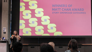 Ekin Yasin, PhD, introduces the Matt Chan Storytelling Award at Communication Leadership's Screen Summit, recognizing outstanding student projects