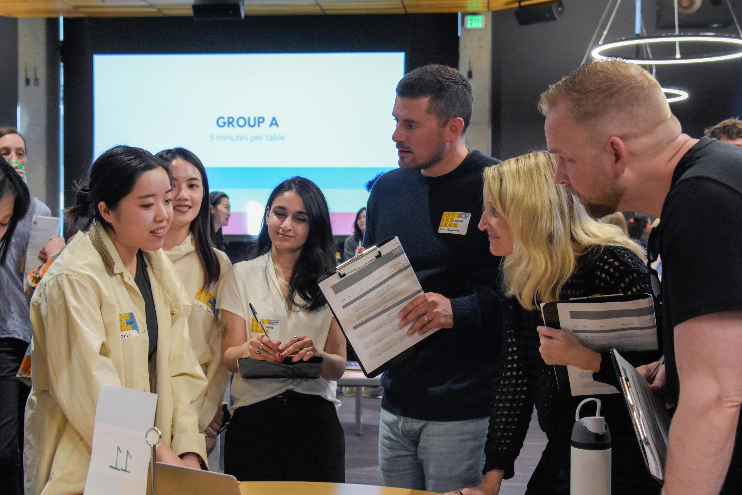 Students presenting project to judges